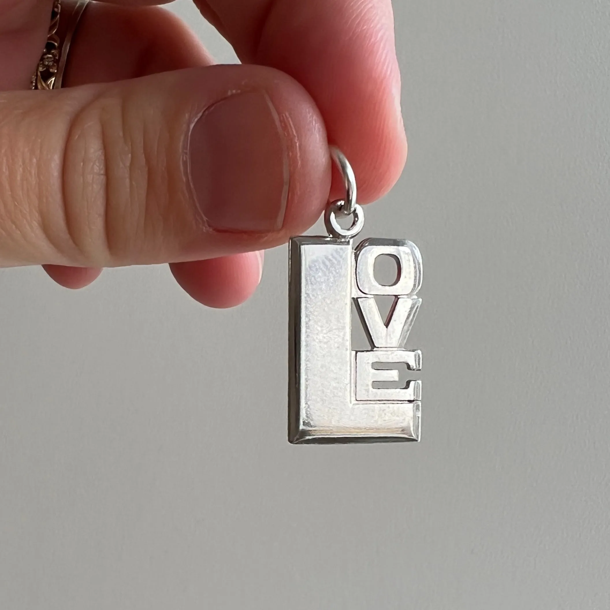 V I N T A G E // balanced LOVE / sterling silver LOVE / a pendant charm