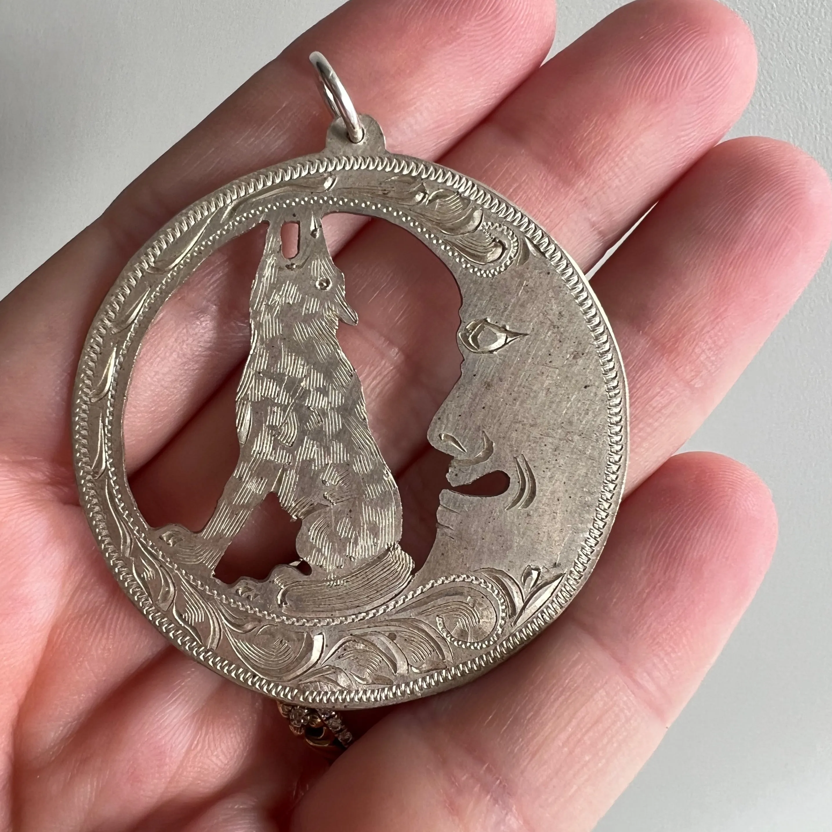 V I N T A G E // wolf and the moon / sterling silver moon and howling wolf / a large pendant